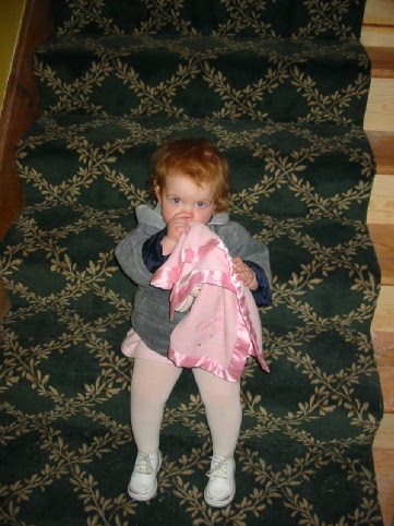 Jane on steps waiting to go to Thanksgiving dinner